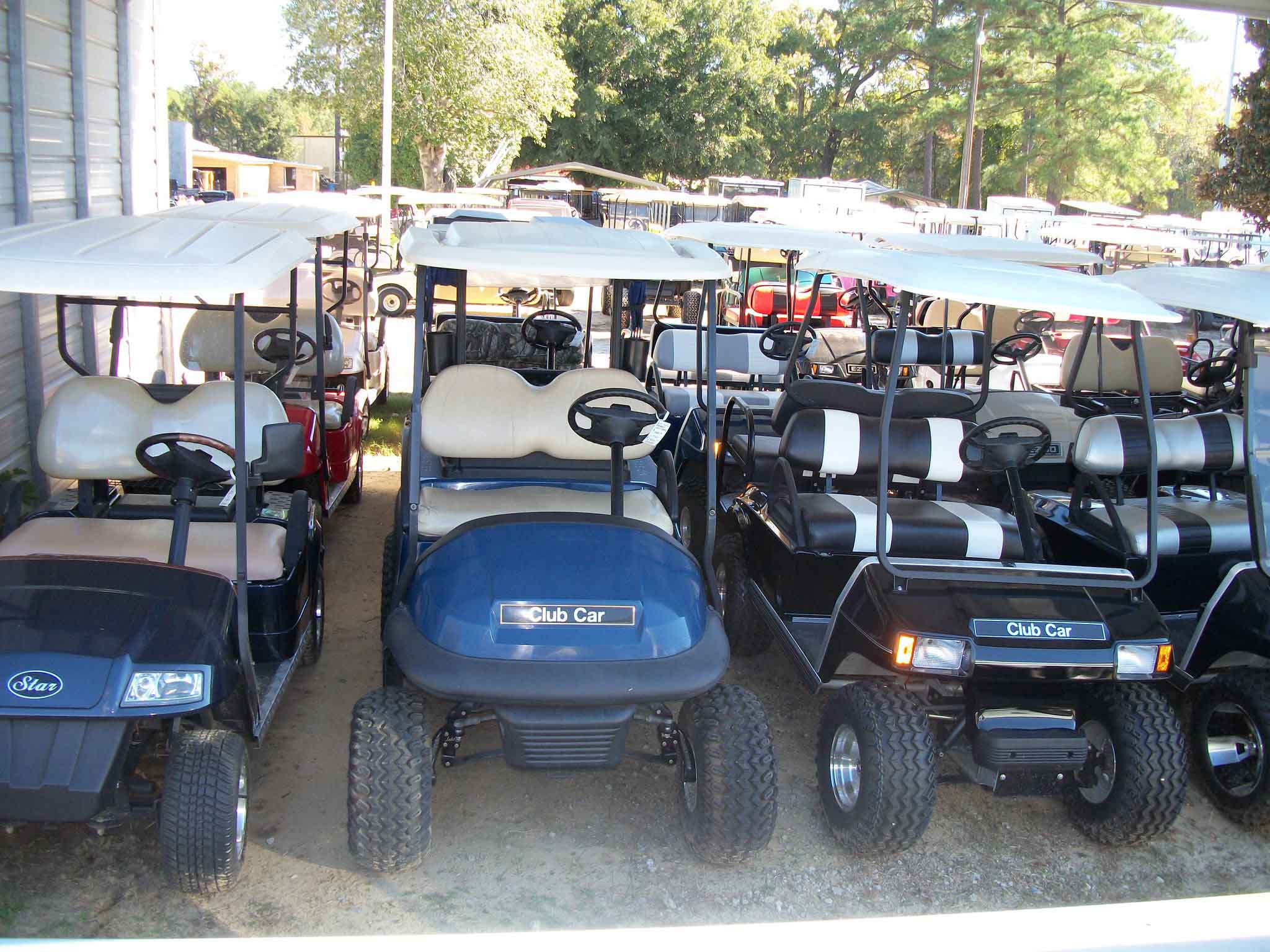Lot with many Golf cars